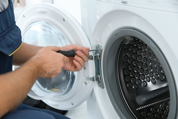 Professional appliance repair technician with washing machine, dishwasher, refrigerator, and other kitchen appliances - Dublin appliance repair services in Blanchardstown, Neilstown, Clondalkin, Clonsilla & more.